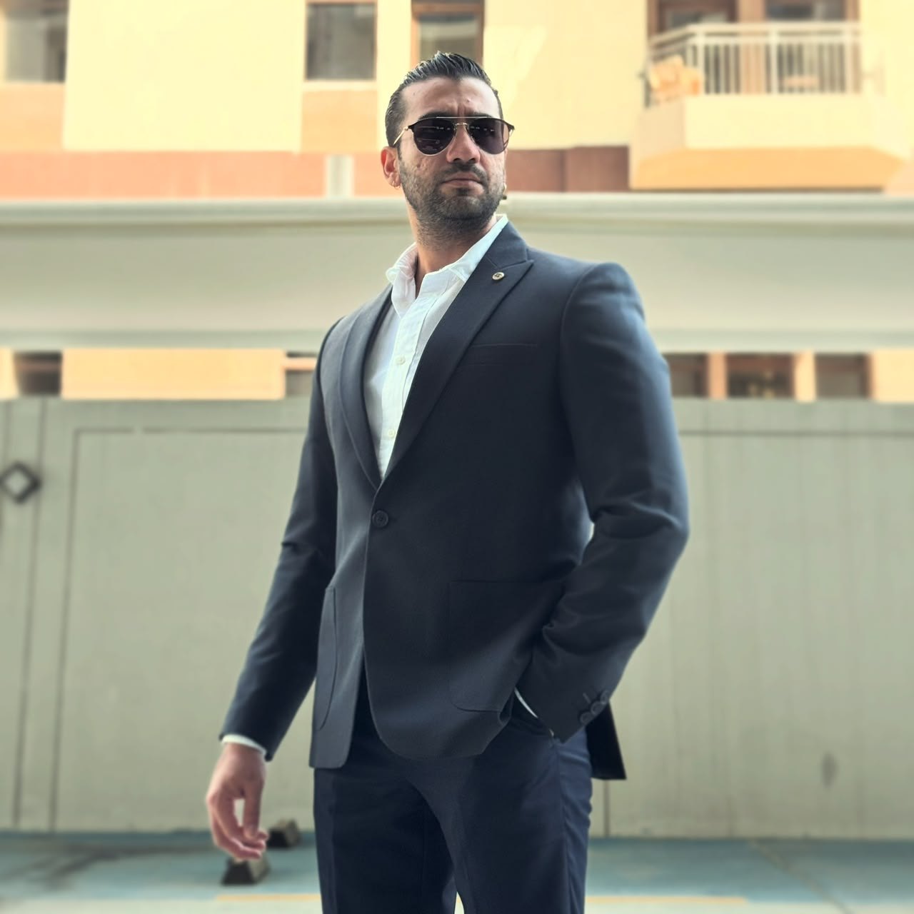 Mehras Ayazi in formal attire